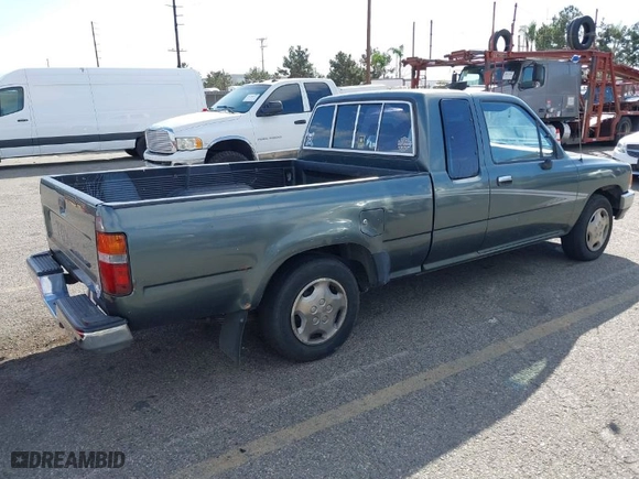 1992 Toyota 2WD Pickups DLX with VIN JT4RN93P5N5058671, listed as a IAAI auction lot 41712213 with NaN miles. Bid and sale history available at carsss.com. Image 4.