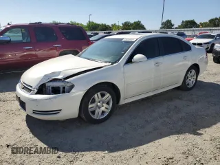 2014 Chevrolet Impala LT with VIN 2G1WB5E39E1167594, listed as a Copart auction lot 55836905 with 136,690 mi miles and Salvage Title. Bid and sale history available at DreamBid. Image 1.