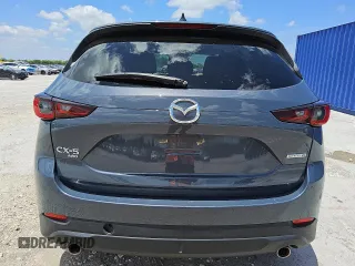 2024 Mazda CX-5 S Carbon Edition z VIN JM3KFBCL3R0481732, wystawiony jako Copart lot #56997135 z przebiegiem 32 887 mil mil oraz Tytuł czysty. Historia ofert i sprzedaży dostępna na DreamBid. Obrazek 6.