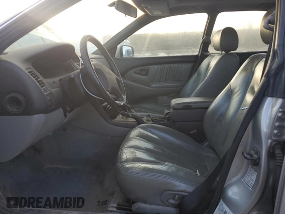 2000 Mitsubishi Diamante LS z VIN 6MMAP67P5YT006608, wystawiony jako Copart lot #49009455 z przebiegiem 241 503 mil mil oraz Tytuł czysty. Historia ofert i sprzedaży dostępna na DreamBid. Obrazek 7.