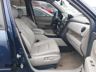 2013 Honda Pilot EX-L with VIN 5FNYF4H74DB055195, listed as a IAAI auction lot 41498013 with 127,725 mi miles and . Bid and sale history available at DreamBid. Image 5.