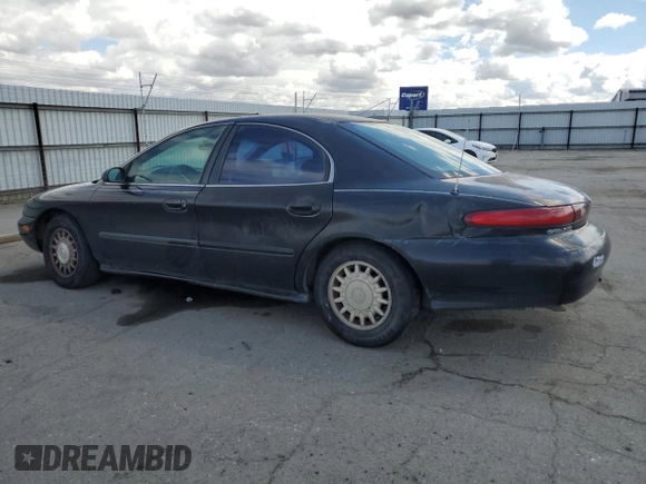 1997 Mercury Sable GS z VIN 1MELM50U1VA620597, wystawiony jako Copart lot #51635765 z przebiegiem 250 824 mil mil oraz Szkoda całkowita • Salvage title. Historia ofert i sprzedaży dostępna na DreamBid. Obrazek 2.