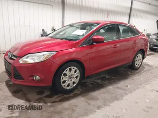 2012 Ford Focus SE z VIN 1FAHP3F21CL114445, wystawiony jako IAAI lot #42277986 z przebiegiem 89 317 mil mil oraz . Historia ofert i sprzedaży dostępna na DreamBid. Obrazek 2.
