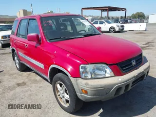 1999 Honda CR-V EX with VIN JHLRD1860XC030573, listed as a IAAI auction lot 42175367 with 182,192 mi miles. Bid and sale history available at carsss.com. Image 1.