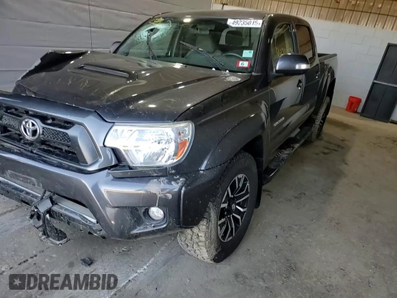 2014 Toyota Tacoma z VIN 3TMMU4FN4EM071741, wystawiony jako Copart lot #49235015 z przebiegiem 60 825 mil mil oraz Szkoda całkowita • Salvage title. Historia ofert i sprzedaży dostępna na DreamBid. Obrazek 11.