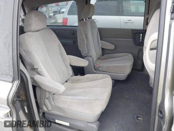 2011 Kia Sedona EX with VIN KNDMH4C74B6374945, listed as a IAAI auction lot 41603400 with 195,848 mi miles. Bid and sale history available at carsss.com. Image 8.