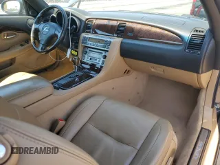2006 Lexus SC 430 with VIN JTHFN48Y069007014, listed as a Copart auction lot 57639905 with 90,938 mi miles and Salvage title. Bid and sale history available at DreamBid. Image 8.