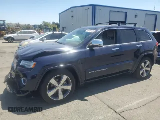 2015 Jeep Grand Cherokee Overland with VIN 1C4RJFCG0FC629863, listed as a Copart auction lot 63098475 with 92,426 mi miles and Salvage title. Bid and sale history available at DreamBid. Image 1.