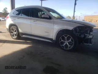 2017 BMW X1 sDrive28i with VIN WBXHU7C31H5H37217, listed as a Copart auction lot 70114342 with 73,683 mi miles. Bid and sale history available at carsss.com. Image 4.
