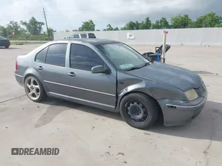 2004 Volkswagen Jetta GL z VIN 3VWRK69MX4M082958, wystawiony jako IAAI lot #42524511 z przebiegiem 276 577 mil mil oraz . Historia ofert i sprzedaży dostępna na DreamBid. Obrazek 1.