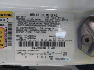 2018 Ford Fusion Hybrid Titanium with VIN 3FA6P0RU9JR111570, listed as a IAAI auction lot 41338218 with 94,973 mi miles. Bid and sale history available at carsss.com. Image 9.