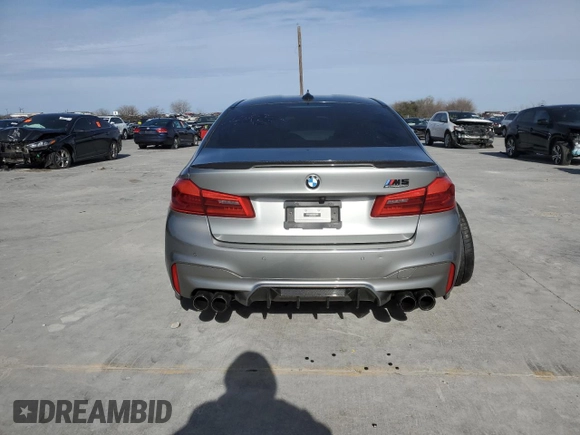 2019 BMW M5 Competition z VIN WBSJF0C54KB284808, wystawiony jako Copart lot #71974952 z przebiegiem 26 888 mil mil oraz . Historia ofert i sprzedaży dostępna na DreamBid. Obrazek 6.