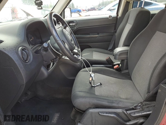 2014 Jeep Patriot Latitude with VIN 1C4NJRFB1ED651525, listed as a Copart auction lot 52526975 with 135,088 mi miles and Salvage Title. Bid and sale history available at carsss.com. Image 7.