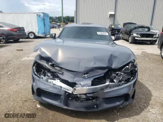 2023 Toyota GR Supra 3.0 with VIN WZ1DB0G02PW055771, listed as a Copart auction lot 61064854 with 19,406 mi miles and Salvage Title. Bid and sale history available at carsss.com. Image 5.
