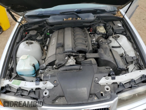 1998 BMW 3 Series 323i with VIN WBABJ8332WEM22760, listed as a Copart auction lot 59631805 with 77,300 mi miles and Salvage title. Bid and sale history available at DreamBid. Image 11.