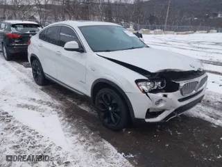 2018 BMW X4 xDrive28i with VIN 5UXXW3C5XJ0T82043, listed as a IAAI auction lot 41246495 with NaN miles. Bid and sale history available at carsss.com. Image 1.