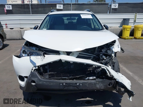 2014 Toyota RAV4 LE with VIN JTMZFREV0EJ020622, listed as a IAAI auction lot 42606275 with 41,645 mi miles and . Bid and sale history available at DreamBid. Image 6.