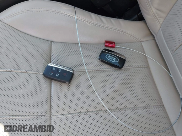 2015 Land Rover Range Rover Evoque Prestige with VIN SALVV2BG1FH001240, listed as a IAAI auction lot 41768760 with 98,711 mi miles and . Bid and sale history available at DreamBid. Image 11.