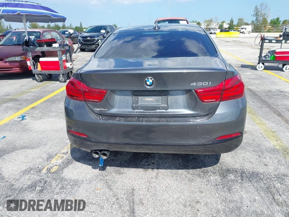 2018 BMW 4 Series 430i with VIN WBA4W3C57JAC97210, listed as a IAAI auction lot 41943772 with 89,232 mi miles and . Bid and sale history available at DreamBid. Image 15.
