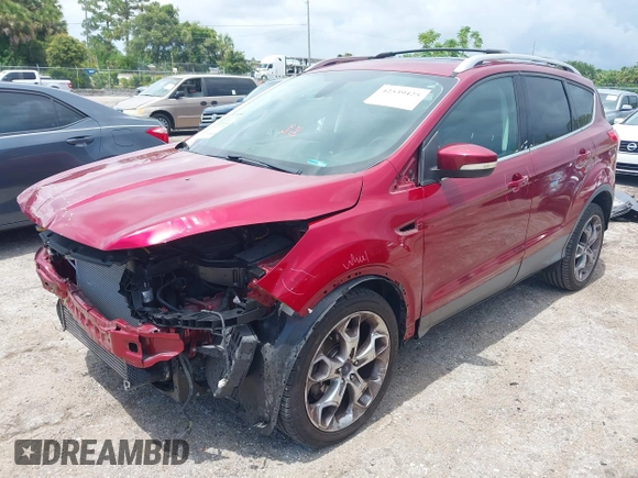2013 Ford Escape Titanium with VIN 1FMCU0J96DUC67636, listed as a IAAI auction lot 42539425 with 120,593 mi miles and . Bid and sale history available at DreamBid. Image 18.