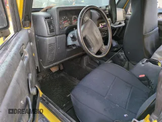 2003 Jeep Wrangler Sport with VIN 1J4FA49S93P373532, listed as a Copart auction lot 74595774 with 105,018 mi miles and Non Repairable. Bid and sale history available at carsss.com. Image 8.
