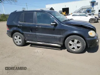 2005 Mercedes-Benz M 350 with VIN 4JGAB57E05A525053, listed as a Copart auction lot 56930405 with 189,146 mi miles and Salvage title. Bid and sale history available at DreamBid. Image 4.