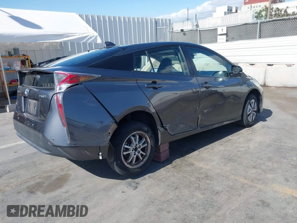 2017 Toyota Prius Two with VIN JTDKARFU4H3036689, listed as a IAAI auction lot 42265196 with 110,310 mi miles and . Bid and sale history available at DreamBid. Image 4.
