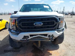 2021 Ford F-150 XL with VIN 1FTFW1E54MFC82133, listed as a IAAI auction lot 42170024 with 24,548 mi miles and . Bid and sale history available at DreamBid. Image 6.