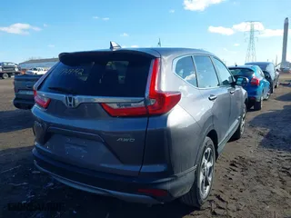 2018 Honda CR-V EX-L with VIN 7FARW2H89JE051063, listed as a IAAI auction lot 41748142 with 90,834 mi miles. Bid and sale history available at carsss.com. Image 4.