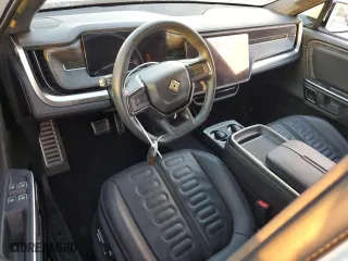 2023 Rivian R1S Adventure with VIN 7PDSGABAXPN004854, listed as a Copart auction lot 75369664 with 0 mi miles and Salvage Title. Bid and sale history available at carsss.com. Image 8.