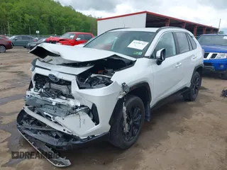 2024 Toyota RAV4 Hybrid SE with VIN 2T3T6RFV3RW066117, listed as a IAAI auction lot 42198742 with 12,352 mi miles and . Bid and sale history available at DreamBid. Image 20.