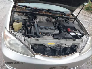 2002 Toyota Camry XLE z VIN JTDBF30K420083381, wystawiony jako IAAI lot #42368073 z przebiegiem 148 746 mil mil oraz . Historia ofert i sprzedaży dostępna na DreamBid. Obrazek 10.