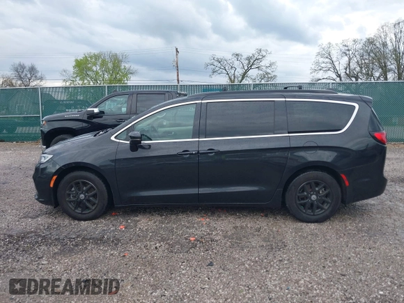 2022 Chrysler Pacifica Touring L with VIN 2C4RC1BG9NR194782, listed as a IAAI auction lot 41842410 with 76,231 mi miles and . Bid and sale history available at DreamBid. Image 14.