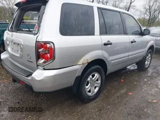 2007 Honda Pilot LX with VIN 2HKYF18157H530370, listed as a IAAI auction lot 41967033 with 214,590 mi miles and . Bid and sale history available at DreamBid. Image 4.