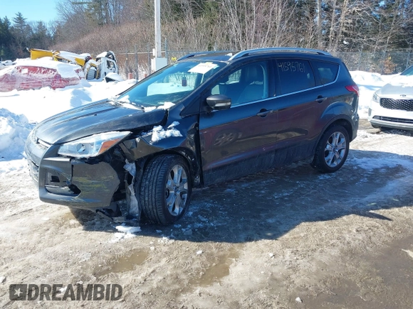 2015 Ford Escape Titanium with VIN 1FMCU9JX6FUB86304, listed as a IAAI auction lot 41595761 with 104,317 mi miles and . Bid and sale history available at DreamBid. Image 2.