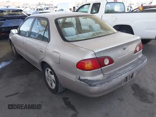 2002 Toyota Corolla CE with VIN 1NXBR12E82Z624794, listed as a IAAI auction lot 42571532 with 122,749 mi miles and . Bid and sale history available at DreamBid. Image 3.