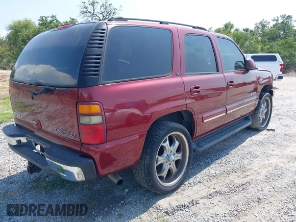 2003 Chevrolet Tahoe LT with VIN 1GNEC13Z93J234088, listed as a IAAI auction lot 42244167 with 183,070 mi miles and . Bid and sale history available at DreamBid. Image 4.