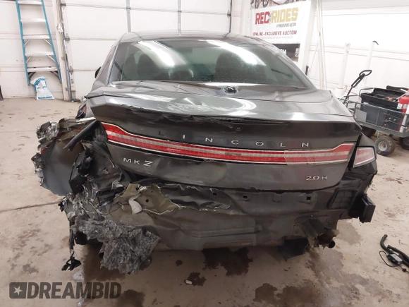 2015 Lincoln MKZ Hybrid with VIN 3LN6L2LU0FR624283, listed as a IAAI auction lot 41402447 with 79,883 mi miles and . Bid and sale history available at DreamBid. Image 17.