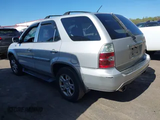 2004 Acura MDX Touring Pkg with VIN 2HNYD18694H521669, listed as a IAAI auction lot 42040542 with 294,325 mi miles. Bid and sale history available at carsss.com. Image 3.