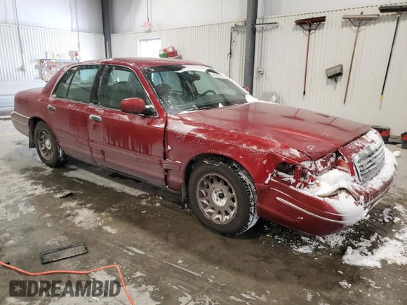 2001 Ford Crown Victoria LX z VIN 2FAFP74W21X206992, wystawiony jako Copart lot #45082985 z przebiegiem 137 954 mil mil oraz Szkoda całkowita • Salvage title. Historia ofert i sprzedaży dostępna na DreamBid. Obrazek 4.