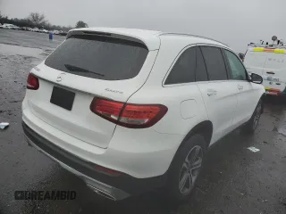 2019 Mercedes-Benz GLC with VIN WDC0G4KB4KV131837, listed as a Copart auction lot 70310052 with 64,571 mi miles. Bid and sale history available at carsss.com. Image 3.