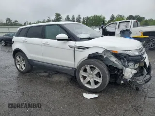 2015 Land Rover Range Rover Evoque Pure Premium with VIN SALVR2BG6FH044489, listed as a Copart auction lot 61339585 with 96,657 mi miles and Salvage title. Bid and sale history available at DreamBid. Image 4.