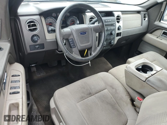 2009 Ford F-150 STX with VIN 1FTRX128X9FB21799, listed as a Copart auction lot 58263855 with 214,192 mi miles and Salvage title. Bid and sale history available at DreamBid. Image 8.