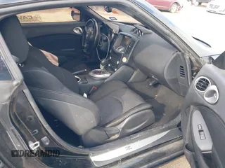 2015 Nissan 370Z Sport with VIN JN1AZ4EH8FM443095, listed as a IAAI auction lot 41105775 with 135,354 mi miles. Bid and sale history available at carsss.com. Image 5.