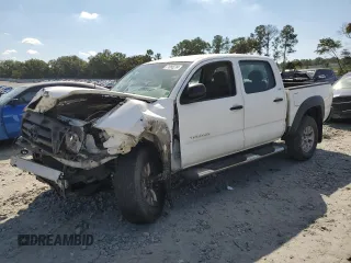 2009 Toyota Tacoma PreRunner with VIN 3TMJU62N09M077434, listed as a Copart auction lot 71995214 with 152,943 mi miles and Salvage title. Bid and sale history available at DreamBid. Image 1.