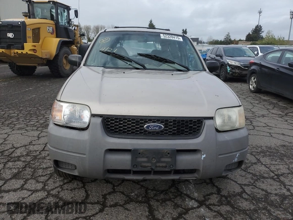 2001 Ford Escape XLS with VIN 1FMYU02111KA37010, listed as a Copart auction lot 52328415 with 312,425 mi miles and Salvage title. Bid and sale history available at DreamBid. Image 5.