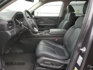 2025 Honda Pilot EX-L z VIN 5FNYG1H44SB040047, wystawiony jako Copart lot #43359925 z przebiegiem 4 896 mil mil oraz Szkoda całkowita • Salvage title. Historia ofert i sprzedaży dostępna na DreamBid. Obrazek 7.