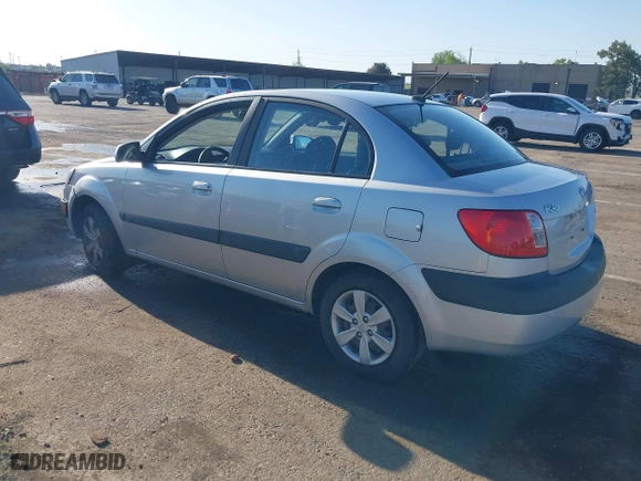 2009 Kia Rio SX with VIN KNADE223296523842, listed as a IAAI auction lot 42024905 with 98,613 mi miles. Bid and sale history available at carsss.com. Image 3.