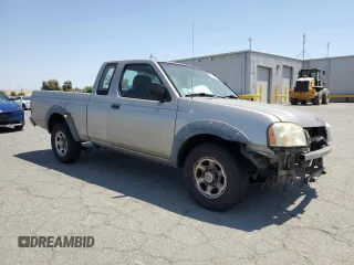 2004 Nissan Frontier XE with VIN 1N6DD26TX4C447116, listed as a Copart auction lot 59432335 with 127,001 mi miles and Salvage title. Bid and sale history available at DreamBid. Image 4.