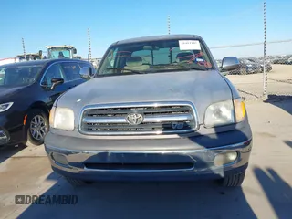 2000 Toyota Tundra SR5 with VIN 5TBRT3413YS019873, listed as a IAAI auction lot 41412497 with 305,472 mi miles and . Bid and sale history available at DreamBid. Image 12.